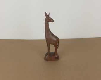 Vintage hand-carved wooden giraffe