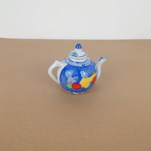 Tetera de cerámica de frutas vintage