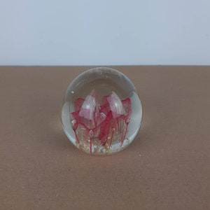 Large Vintage pink and green glass paperweight with naturally formed air bubbles