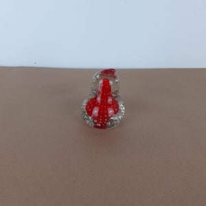 Vintage red pear glass paperweight with naturally formed air bubbles. Made by Mount Royal Merchandise