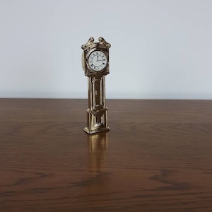 Brass vintage miniature grandfather clock.