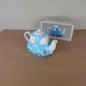 Car teapot. Ornamental ceramic teapot. Made in Taiwan