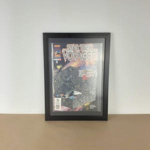 1997 rare Star Trek Voyager #10 near mint condition comic book.