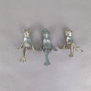 Three lazy frogs shelf ornament. Vintage sturdy brass ornament.