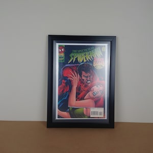 The spectacular Spiderman comic book. Near mint condition #228 framed comic.
