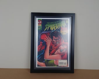 The spectacular Spiderman comic book. Near mint condition #228 framed comic.