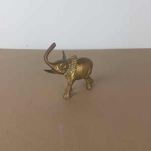 Brass elephant. Vintage miniature brass elephant. Made in England.