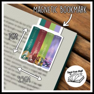 May include: Magnetic bookmark featuring five colourful book spines with illustrations and the text "TJ KLUNE WOLFSONG", "TJ KLUNE RAVENSONG", "TJ KLUNE HEARTSONG", "TJ KLUNE BROTHERSONG", and "Treat Your Shelf". The bookmark measures 7 cm by 5.5 cm.