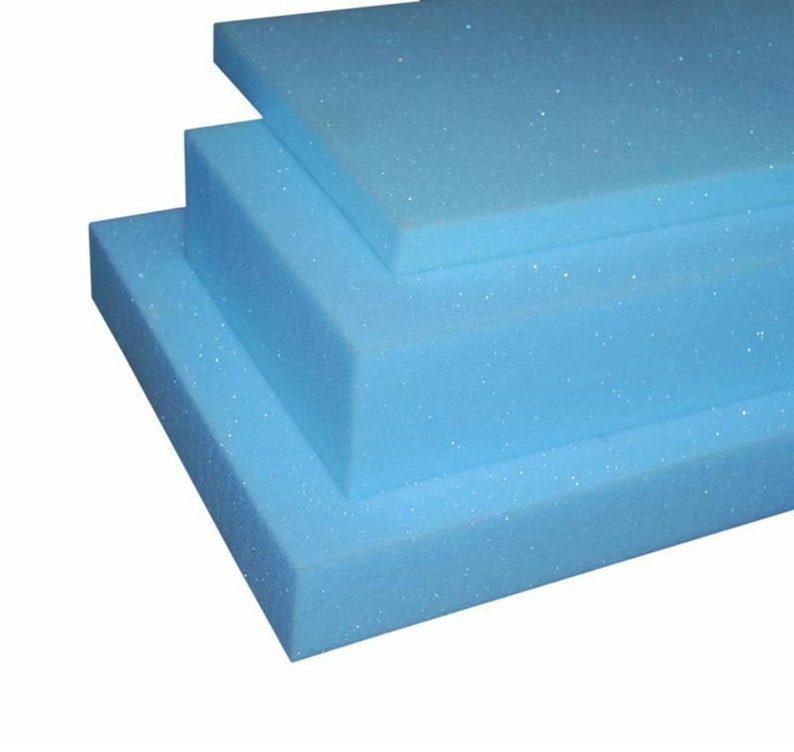 May include: Three pieces of light blue foam padding stacked on top of each other.