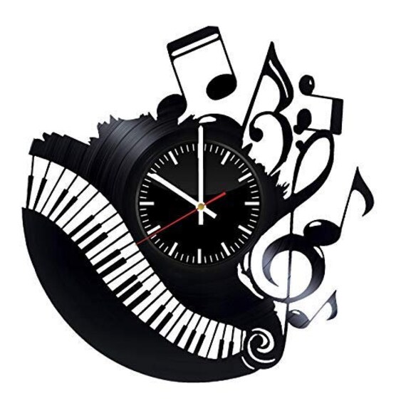 часы омега 1934 года. часы в виде пианино. часы пианиста. часы пианиста. часы пианино.