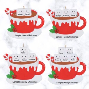 Pick your family members style from this listing.Celebrate the holidays with this Personalized Family Hot Cocoa Ornament – Christmas 2025, a charming keepsake featuring your loved ones’ names on smiling marshmallows. This Custom Marshmallow Family Ornament – Holiday 2025 Keepsake is perfect for cozy Christmas vibes and makes a great addition to your tree. Designed as a Christmas Mug Ornament with Names – Family of 5 – 2025,  Our Hot Chocolate Family Ornament – Christmas Tree Decor 2025 Ornament