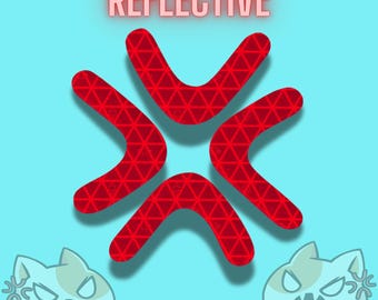 May include: A red reflective decal featuring a four-pointed angular symbol with a triangular grid pattern. Above the symbol, the word REFLECTIVE is printed in red capital letters. Two light blue cat illustrations with angry expressions are at the bottom.