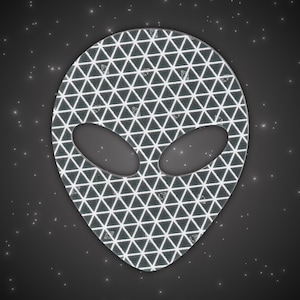 May include: A black and white alien face sticker with a geometric pattern of triangles. The sticker is on a dark gray background with white dots.