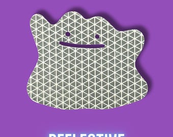 May include: A reflective, grey, blob-shaped design with a white geometric pattern and a purple smiling face. The word "REFLECTIVE" is displayed in white, glowing text at the bottom of the image, set against a purple background.