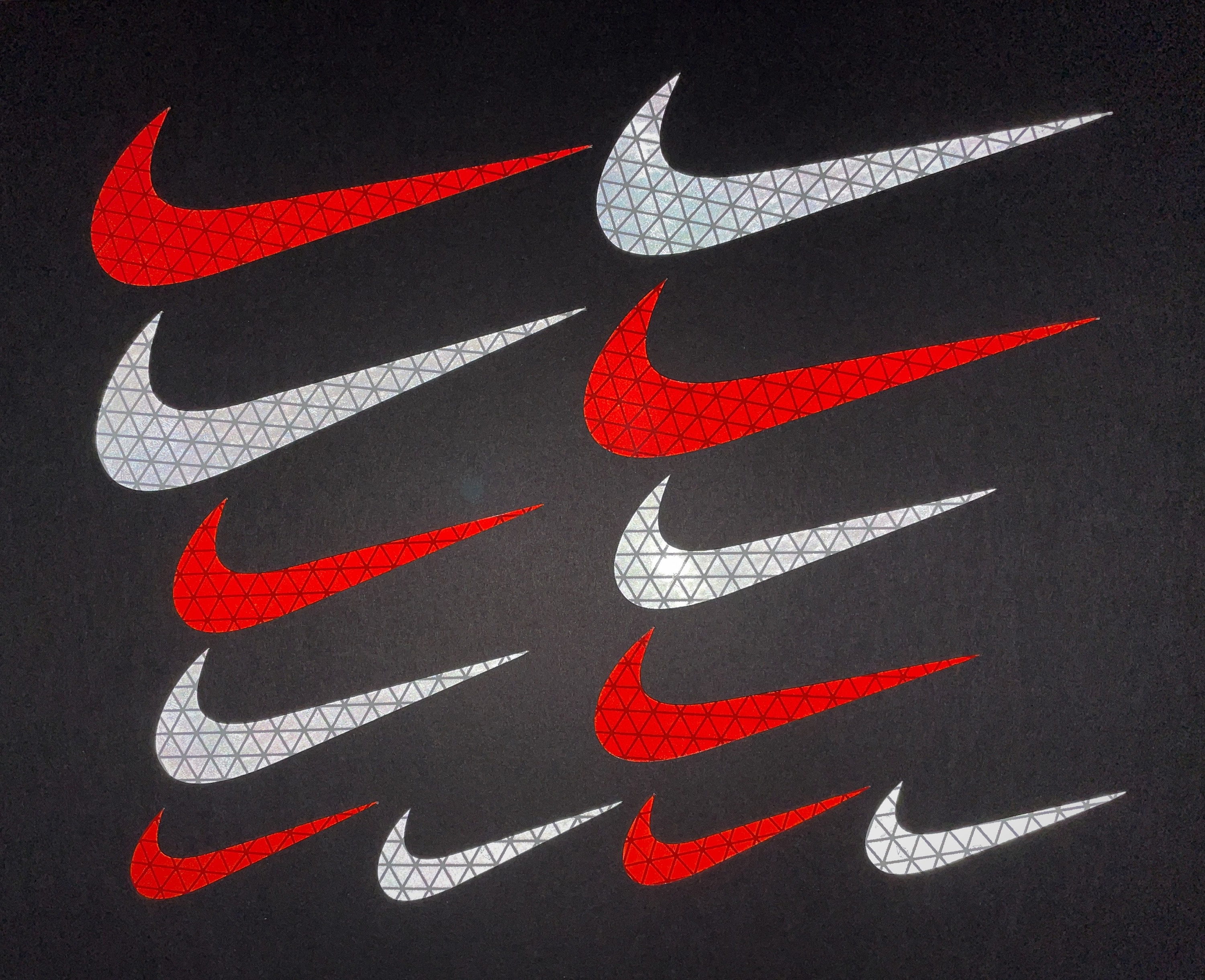 nike swoosh reflective