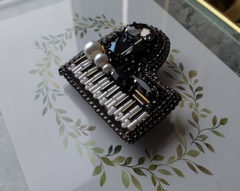 piano brooch