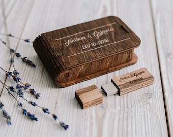 May include: A wooden USB drive with the text "Nathan & Gabriella 20/10/2018" engraved on it. The drive is in a wooden box with the same text engraved on it.