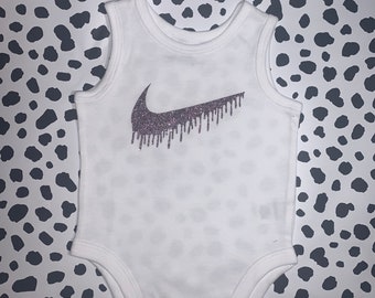 nike girl onesies