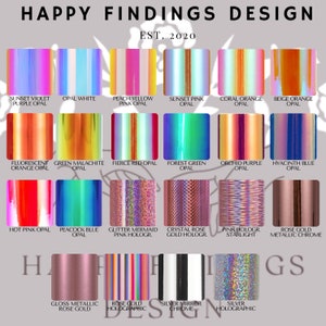 May include: A chart of 18 different iridescent opal and holographic vinyl colors. The colors are arranged in a grid with the names of each color listed below. The chart is titled "Happy Findings Design Est. 2020".