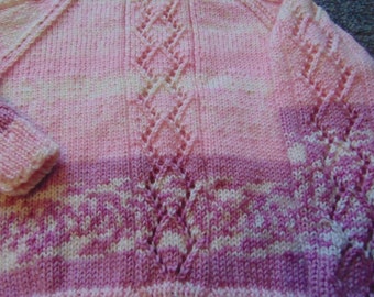 childs pink jumper