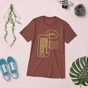 Get Stamped Yellow HPL UNISEX Graphic Tee | Vintage Style, Passport Stamp, Wanderlust, Traveler