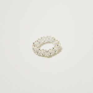 Seed Bead Ring // a thin and continuous silver-lined flower ring
