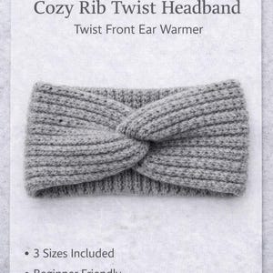 May include: A gray Cozy Rib Twist Headband with a twist front design. The headband is made of a ribbed knit material. The text on the image reads "DYASSE Cozy Rib Twist Headband Twist Front Ear Warmer".