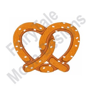 May include: A brown pretzel with white dots, shaped like a figure eight.
