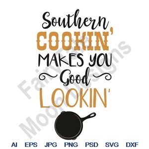 Puede incluir: Texto negro y dorado sobre un fondo blanco que dice "Southern Cookin' Makes You Good Lookin'" con una sartén de hierro fundido negra debajo del texto.
