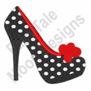 May include: Black and white polka dot high heel shoe with a red trim and a red flower accent.