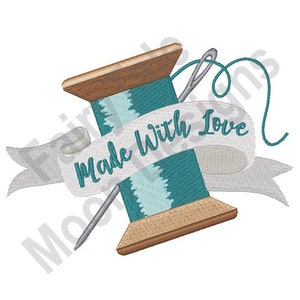 May include: A teal thread spool with a wooden base and a needle threaded through it. A white ribbon with the text "Made with Love" is wrapped around the spool.