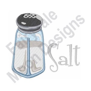 May include: A blue glass salt shaker with a black lid and the word "Salt" written in cursive next to it.