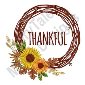 May include: A brown twig wreath with the word "THANKFUL" in the center. The wreath is decorated with sunflowers, leaves, and wheat stalks.