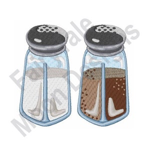 May include: Two glass salt and pepper shakers with silver lids. The salt shaker is filled with white salt and the pepper shaker is filled with black pepper.