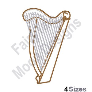 May include: A brown harp with white strings. The harp is a musical instrument.