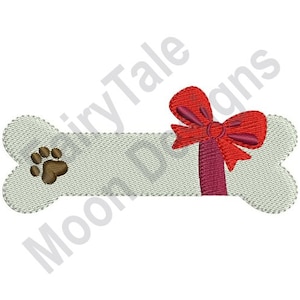 May include: A white bone-shaped dog treat with a brown paw print and a red bow on top.