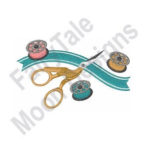 May include: A teal ribbon with three spools of thread, one pink, one gold, and one blue, and a pair of gold scissors.