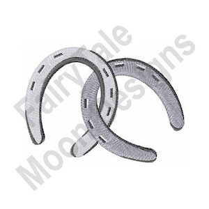 May include: Two silver horseshoes are intertwined, creating a lucky charm symbol. The horseshoes are detailed with black stitching.