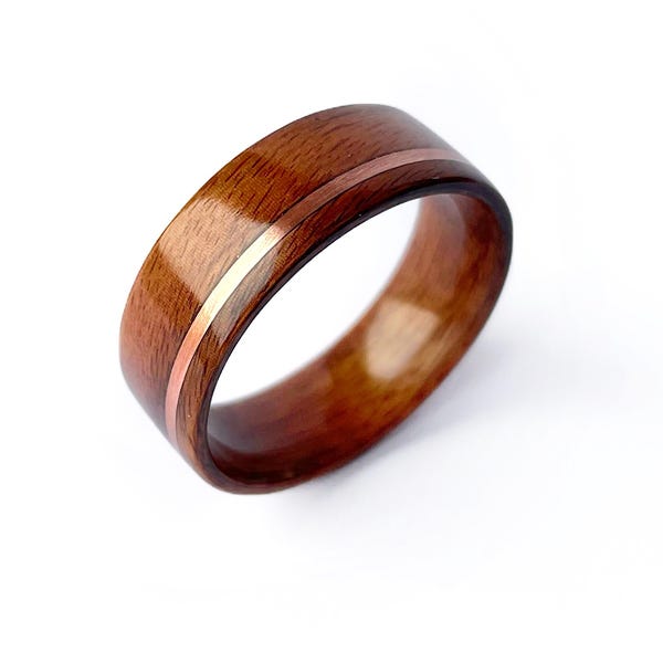 Anello in palissandro: fede nuziale minimalista in legno curvato