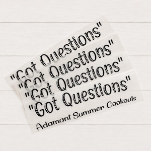May include: A set of four clear adhesive decals featuring the black text "Got Questions" in a stylized, rounded font. The bottom decal also includes the black text "Adamant Summer Cookouts" printed in a simple, sans-serif typeface.