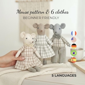 May include: Three handmade mouse dolls wearing plaid outfits. One doll is held by a hand. The dolls are in beige, gray, and white. The text on the image says "Mouse pattern & 6 clothes" and "Beginner Friendly".