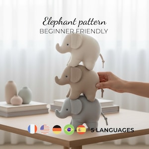 May include: Three plush elephant toys stacked on top of each other, in beige, tan, and gray. The top of the image has the text "Elephant pattern BEGINNER FRIENDLY". The bottom of the image has the text "5 LANGUAGES" and flags.