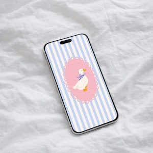 May include: A smartphone with a light blue and white striped background. The phone's screen displays a pink oval with a white goose wearing a blue bow. The goose has a yellow beak and feet. The oval is framed with a scalloped edge.