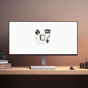 May include: A computer monitor displays a white screen with a black and white illustration of tarot-related symbols. The symbols include a book, crystals, a bag, and playing cards. The monitor sits on a wooden desk with a mouse and other office supplies.