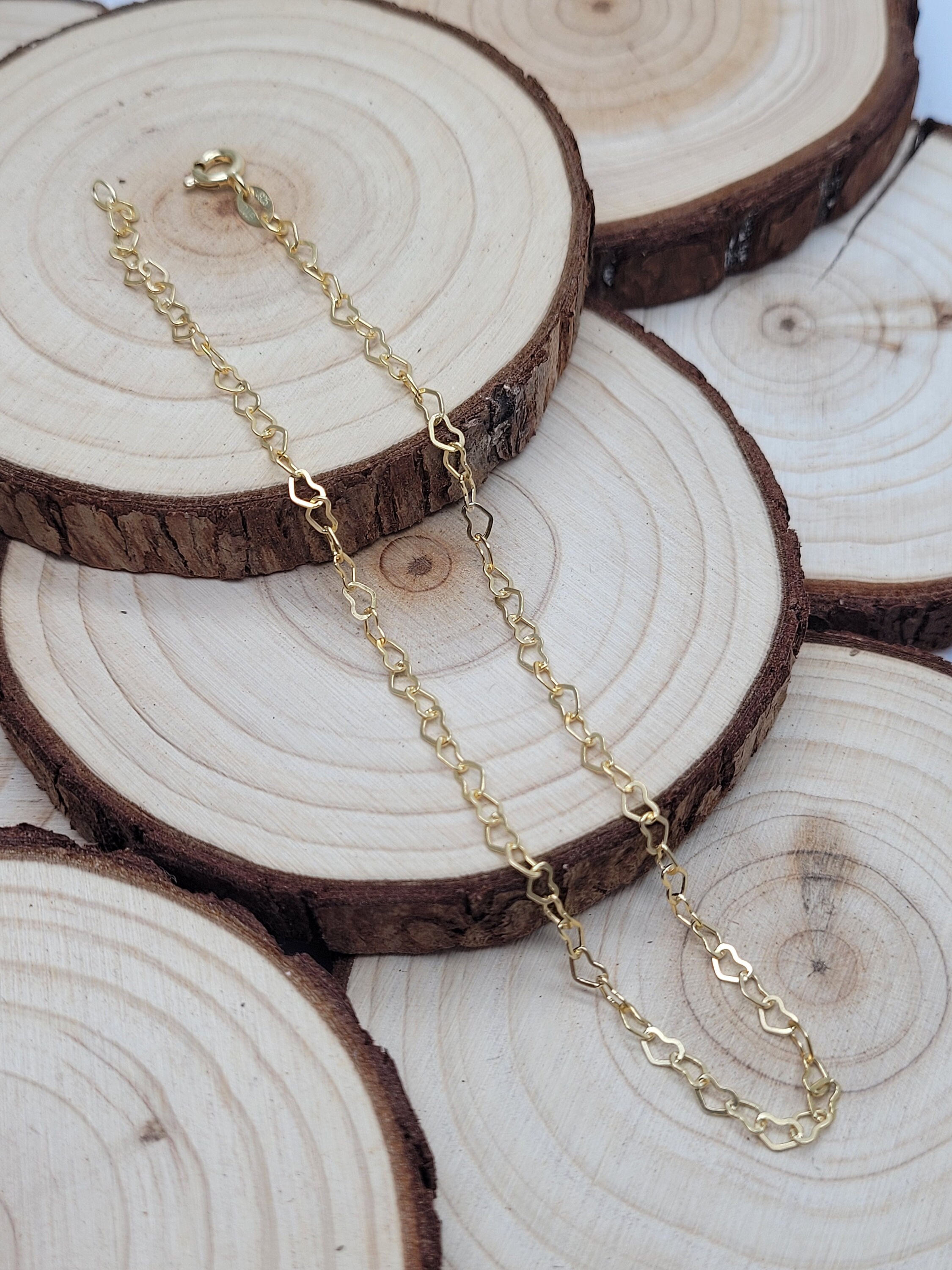 Cavigliera a forma di cuore in oro giallo 9 carati – Catena in argento sterling, punzonata - Italia Cavigliera a forma di cuore in oro giallo 9 carati – Catena in argento sterling, punzonata - Italia