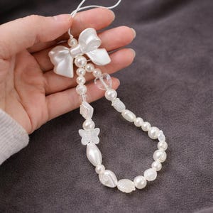 Collier de téléphone avec des perles