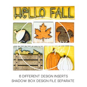 May include: Six different fall-themed designs for a shadow box. The designs include a wooden sign that says "Hello Fall", a maple leaf, an acorn, a squirrel, a pumpkin, and a wooden crate with pumpkins.