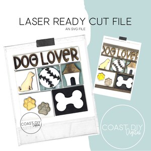 Könnte beinhalten: Eine lasergeschnittene SVG-Datei für ein "Dog Lover"-Schild. Das Design beinhaltet einen Hund, einen Knochen, einen Pfotenabdruck, einen Baseball und eine Hundehütte. Die Datei ist bereit, auf einem Laserschneider geschnitten zu werden.