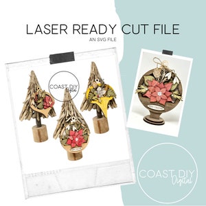 May include: Three laser cut wooden Christmas tree ornaments with a poinsettia design. The ornaments are on a white background with the text "COAST DIY Digital" and "LASER READY CUT FILE AN SVG FILE".