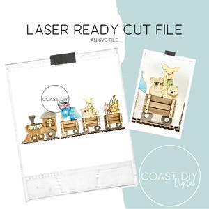May include: Laser-ready cut file of a wooden train with animal figures in the carriages. The train has a locomotive and several carriages with koalas, kangaroos, and other animals. The text "LASER READY CUT FILE" and "AN SVG FILE" are displayed.